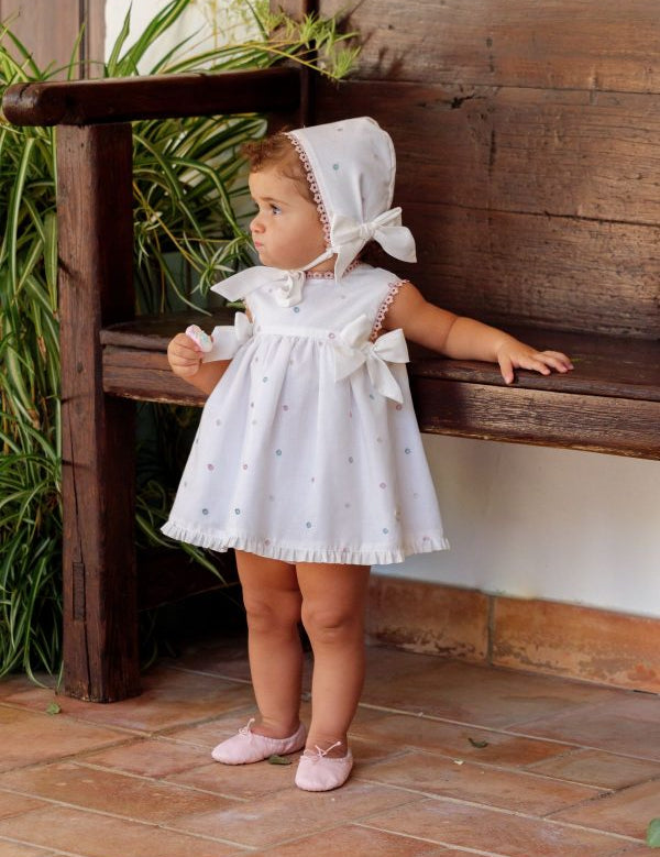 Conjunto vestido, braguita y capota perforado rosa lazos bebé | Cocote by Charanga