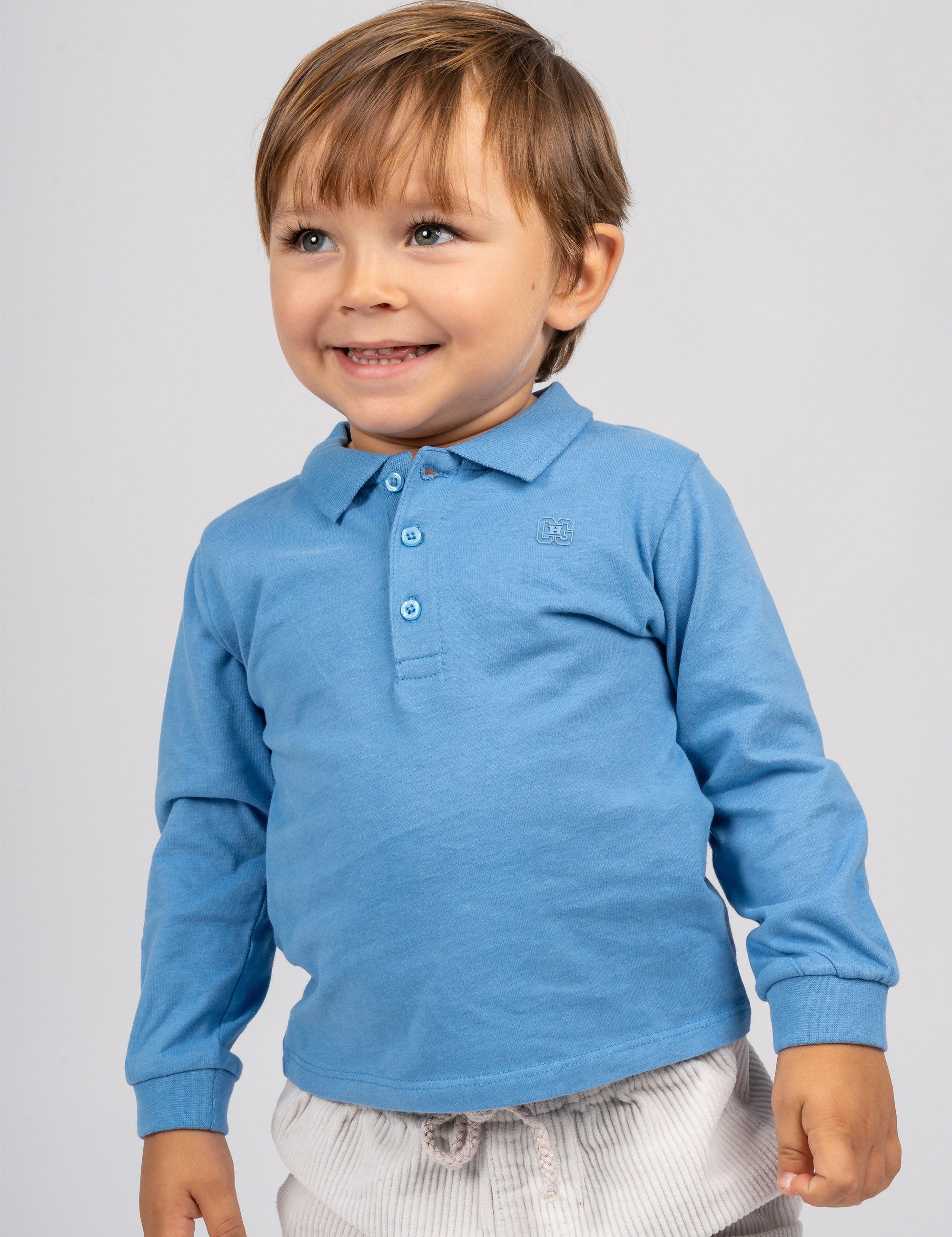 Polo de bebé azul Charanga