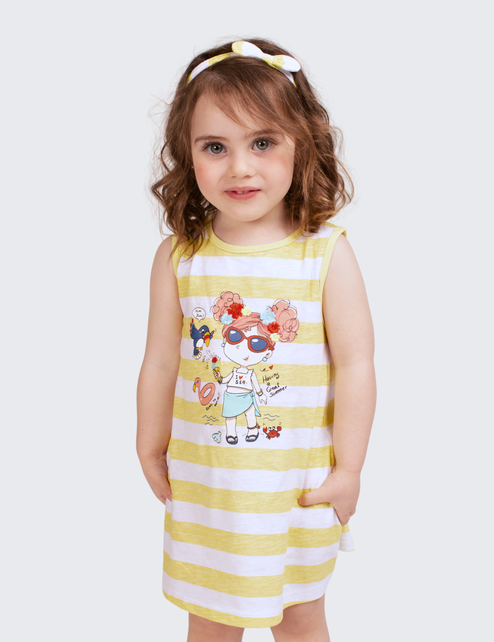 Vestido de bebé a rayas en color amarillo