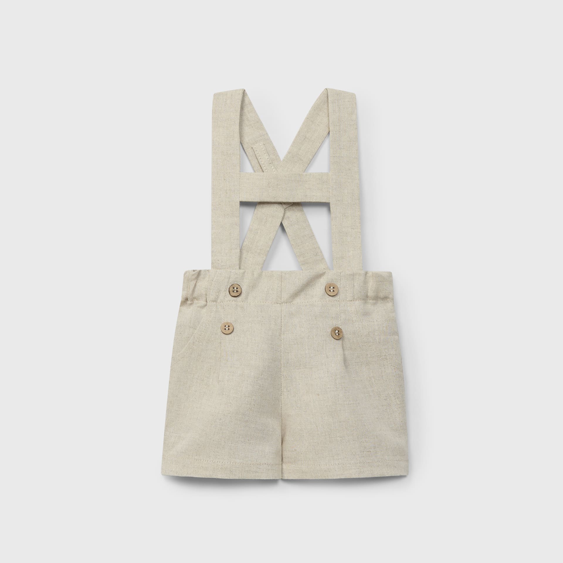 Peto Corto De Lino Con Tirantes Beige Reci n Nacido Dr Kid By Chara peto-corto-de-lino-con-tirantes-beige-reci-n-nacido-dr-kid-by-chara