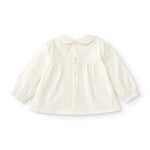 Camisa de bebé en color crudo con detalles de flores Charanga