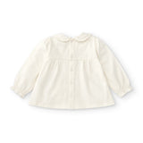 Camisa de bebé en color crudo con detalles de flores Charanga