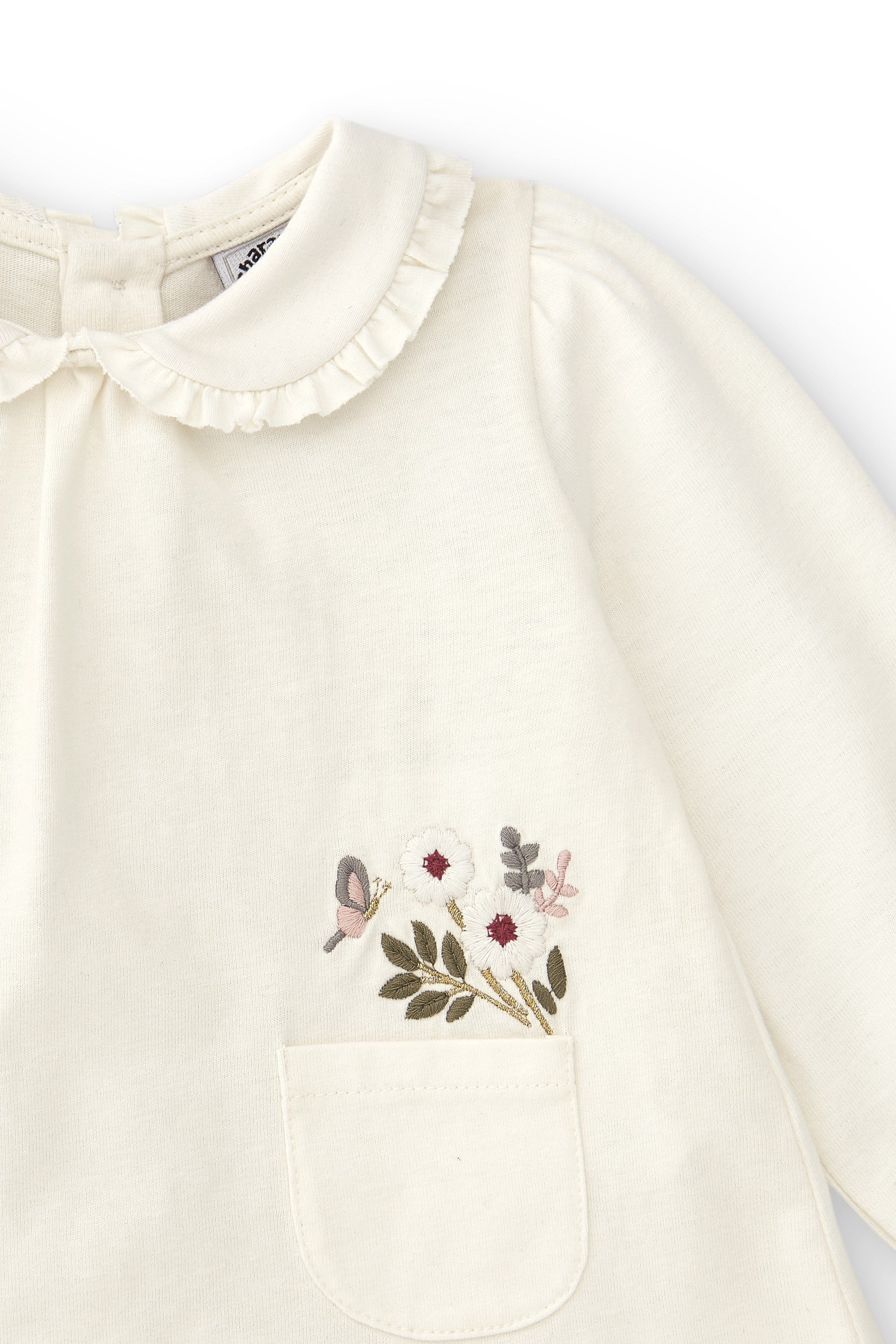 Camisa de bebé en color crudo con detalles de flores Charanga
