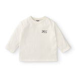 Camiseta en color crudo con texto smile Charanga