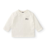 Camiseta en color crudo con texto smile Charanga