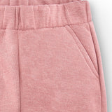 Pantalón de niña rosa y bajos con puños