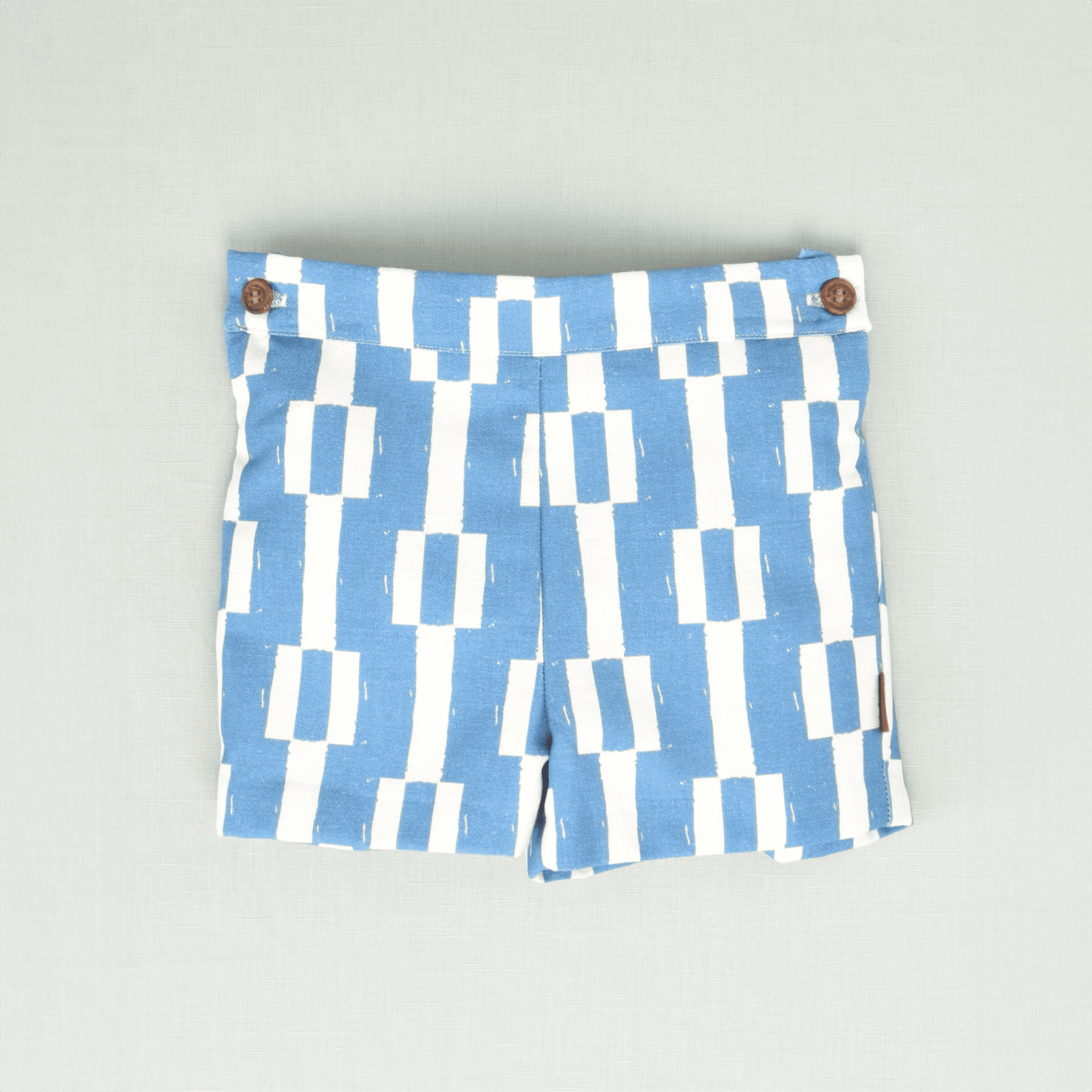 Bermuda geométrica azul niño