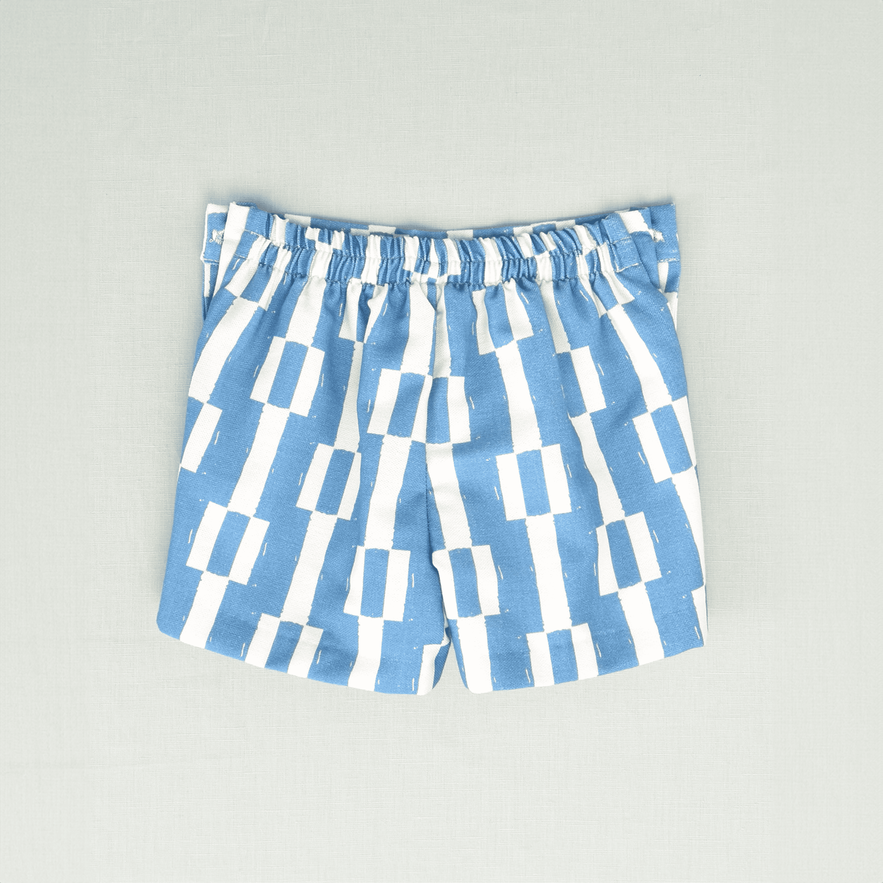 Bermuda geométrica azul niño
