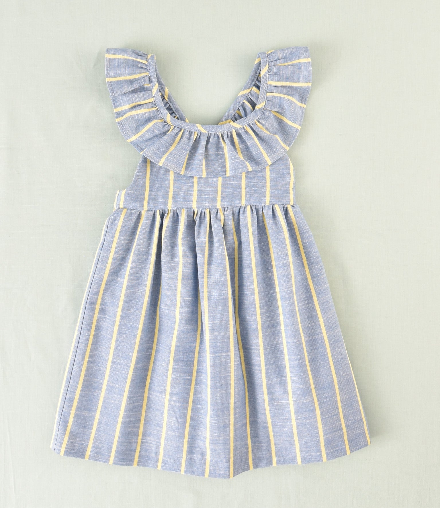 Vestido azul rayas amarillas con volante