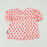 Blusa con estampado de flores coral bebé niña