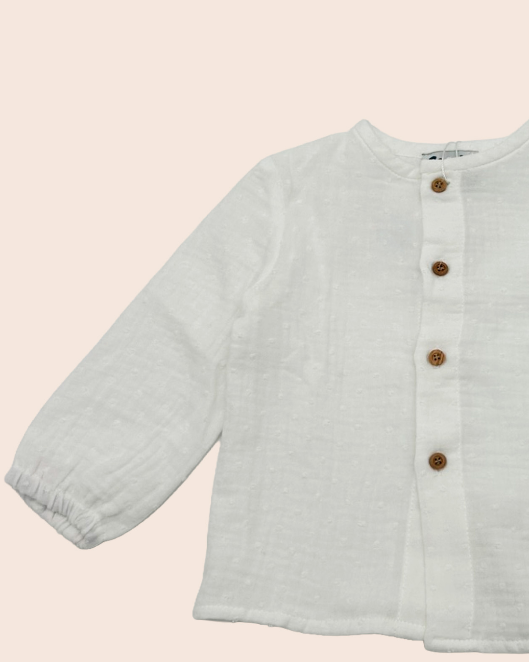 Blusa de bebé blanca con botones de madera | Cocote x Charanga
