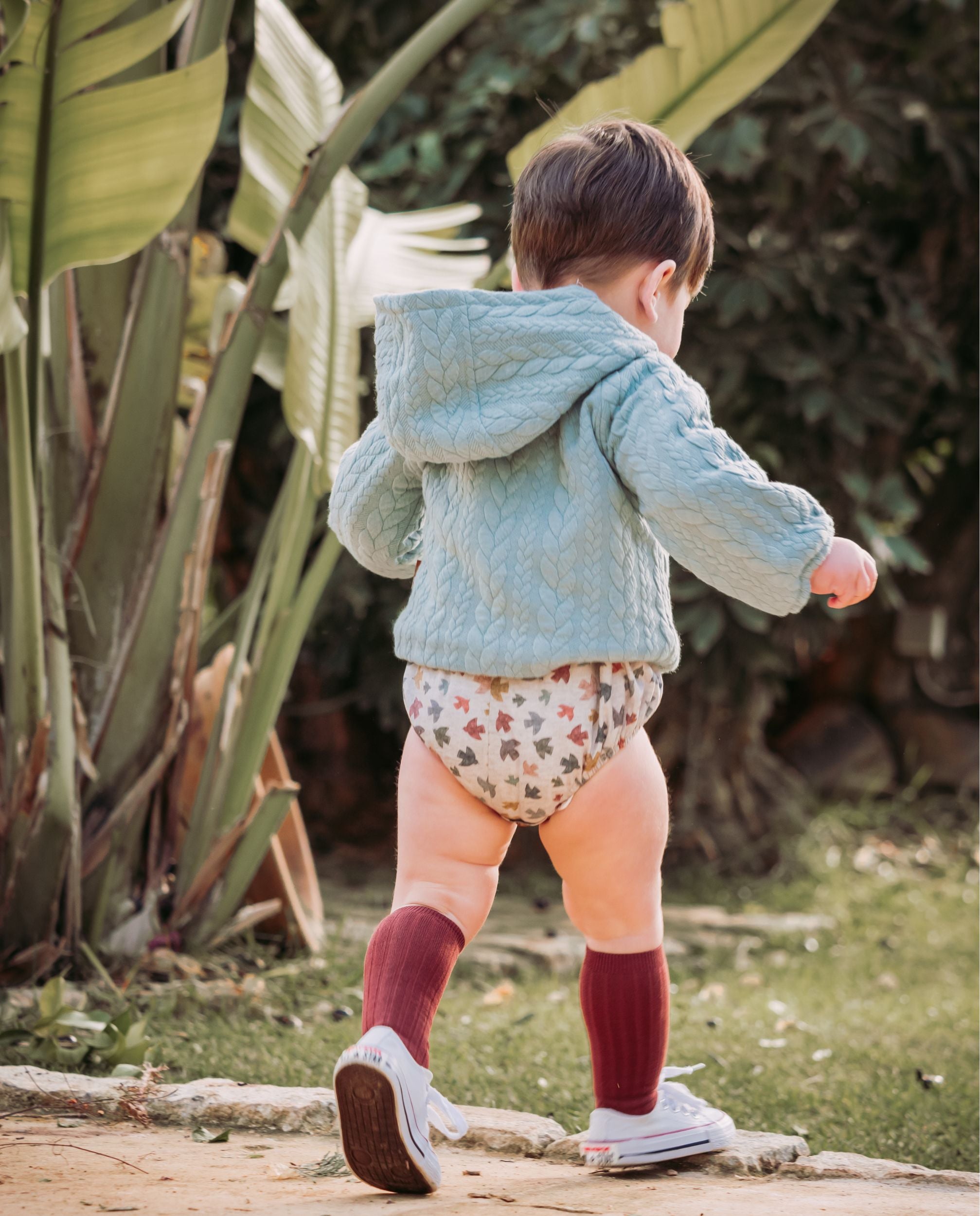 Sudadera de punto con capucha y volante turquesa de bebé Cocote & Charanga