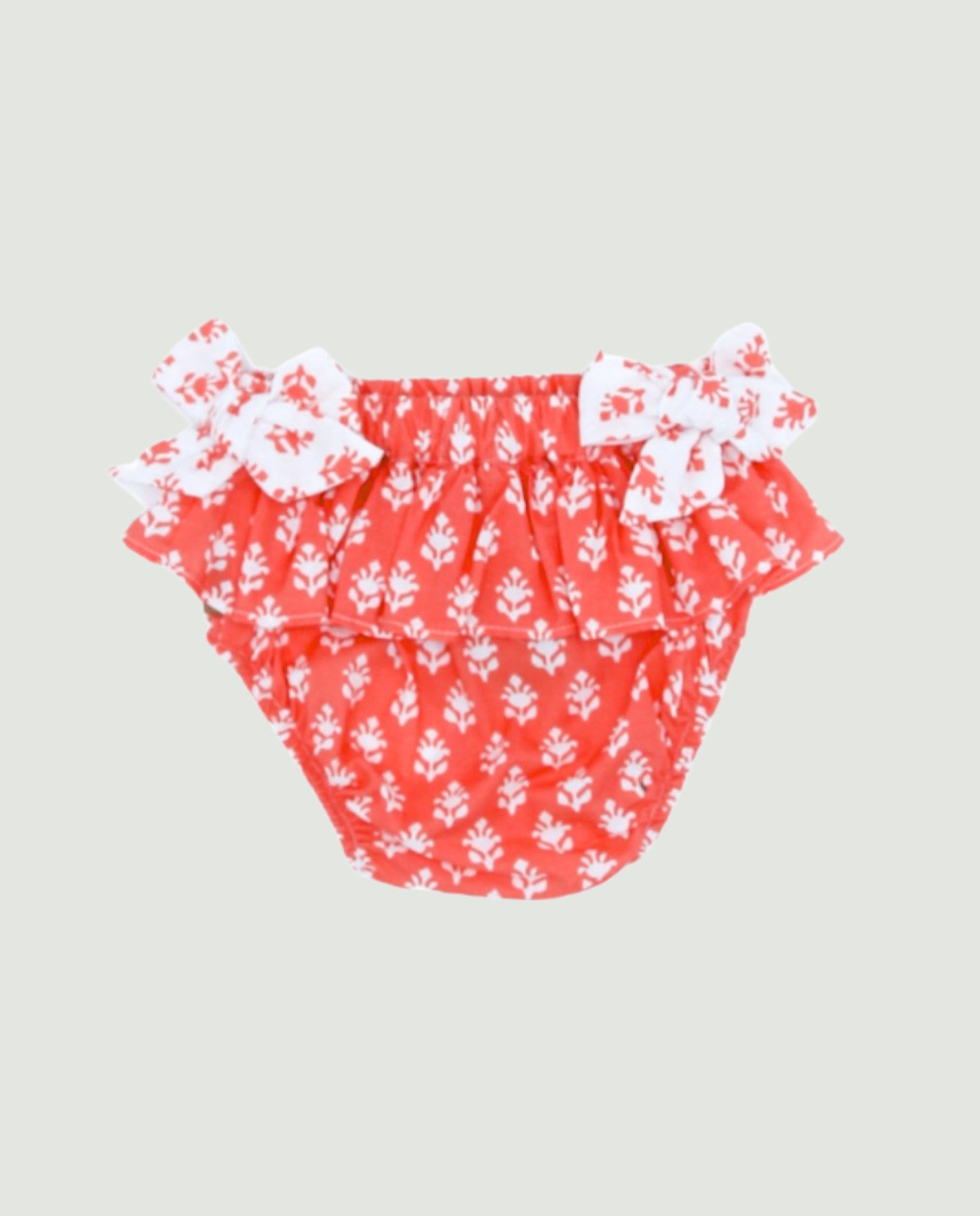 Braguita coral lazos bebé niña