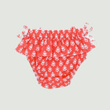 Braguita coral lazos bebé niña