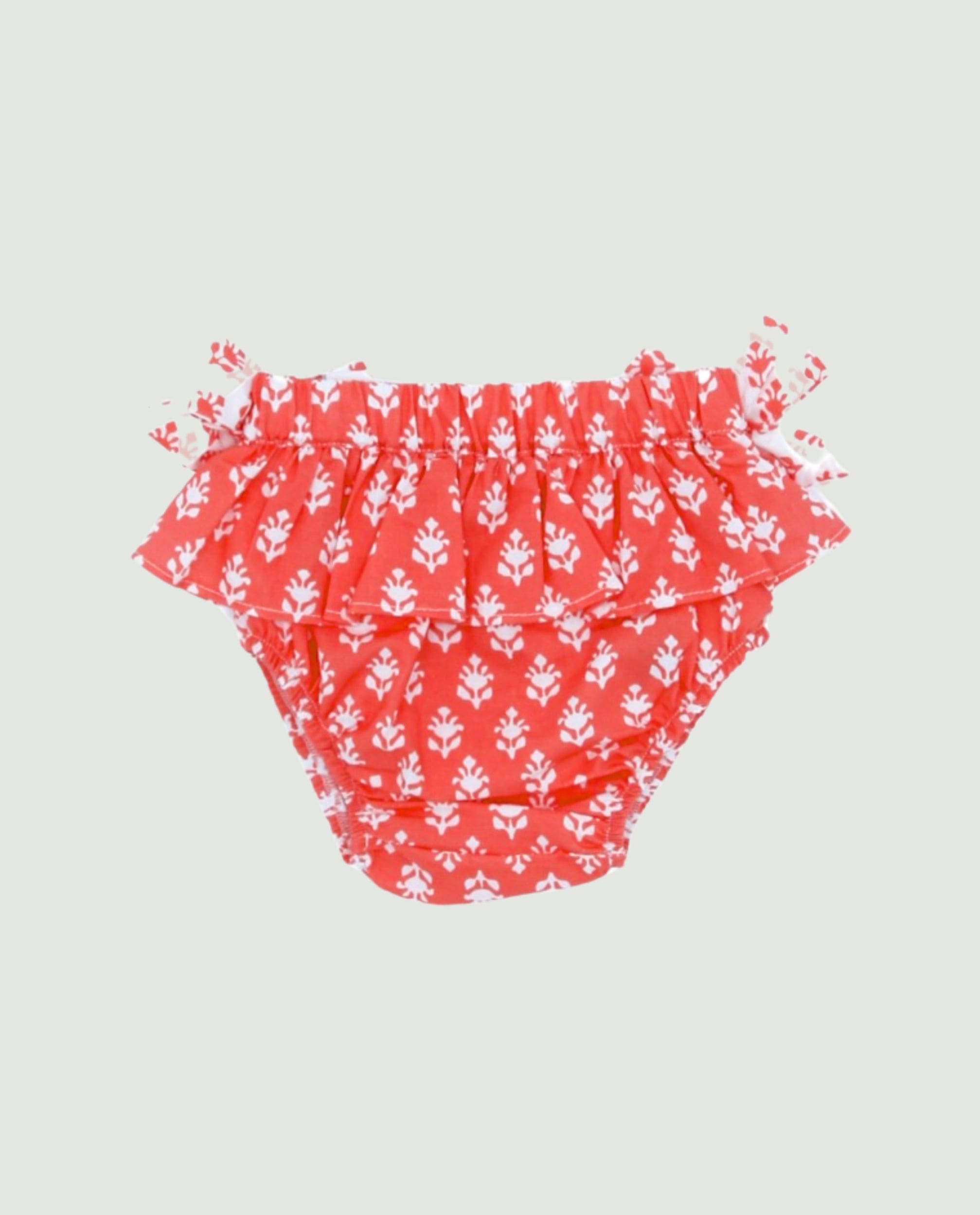 Braguita coral lazos bebé niña