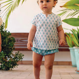 Camisa de flores blanca y turquesa bebé niño