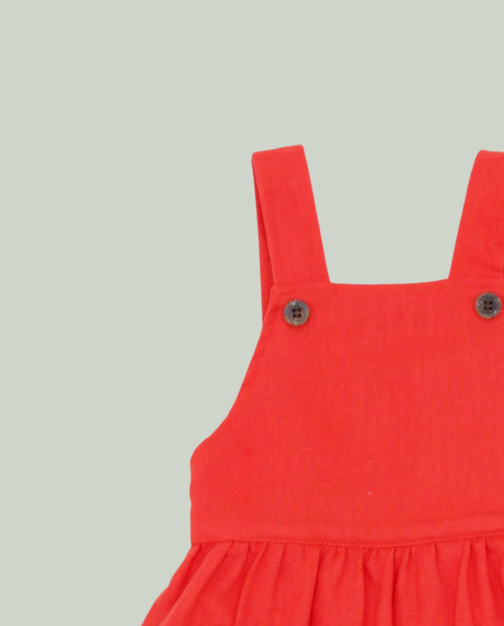 Braguita peto lino coral bebé niña