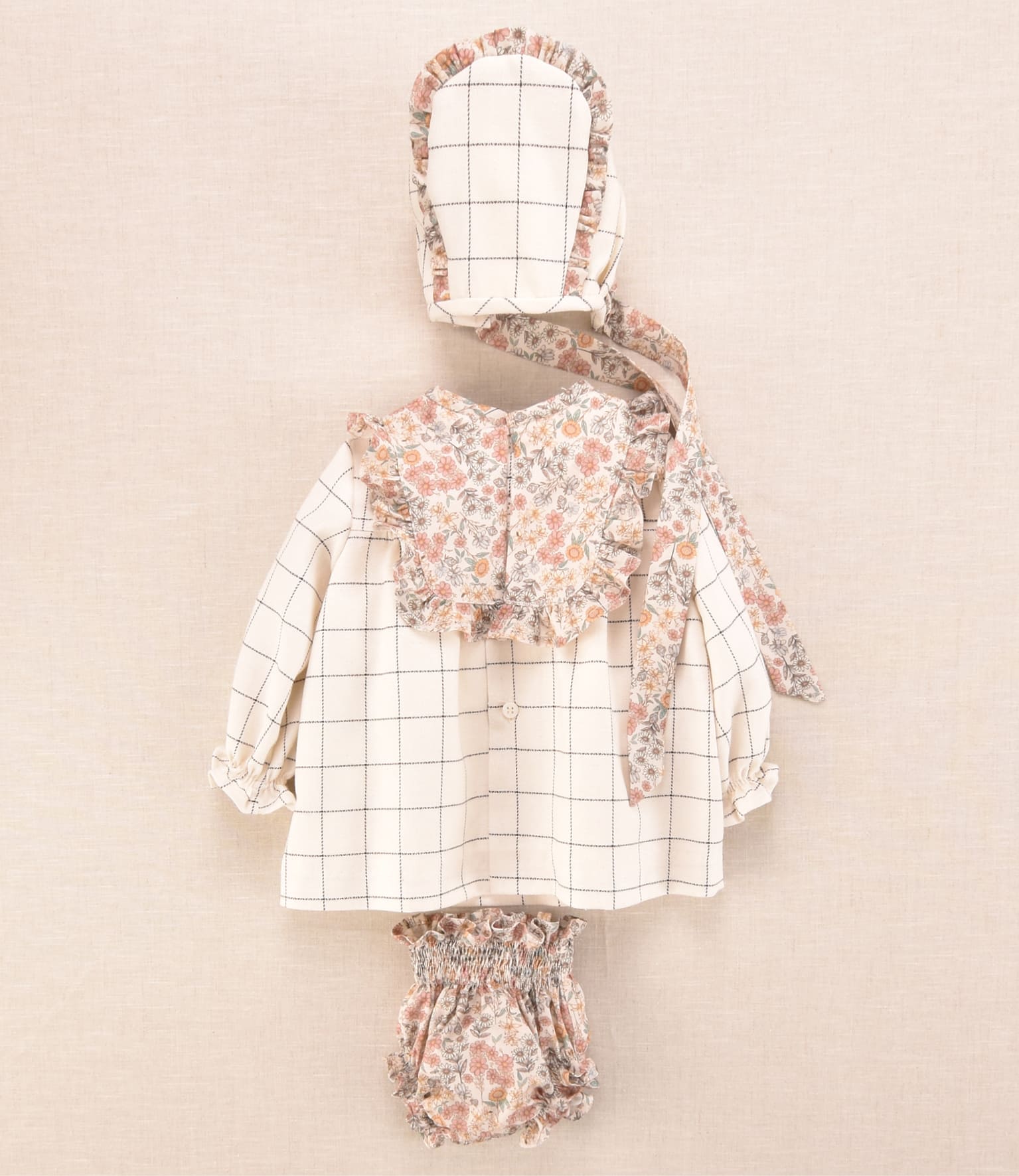 Conjunto bebé niña cuadros y flores con vestido, capota y braguita | Cocote x Charanga