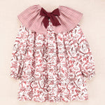 Vestido infantil de manga larga con cuello bebé de cuadros y estampado floral en burdeos, colección Cocote x Charanga