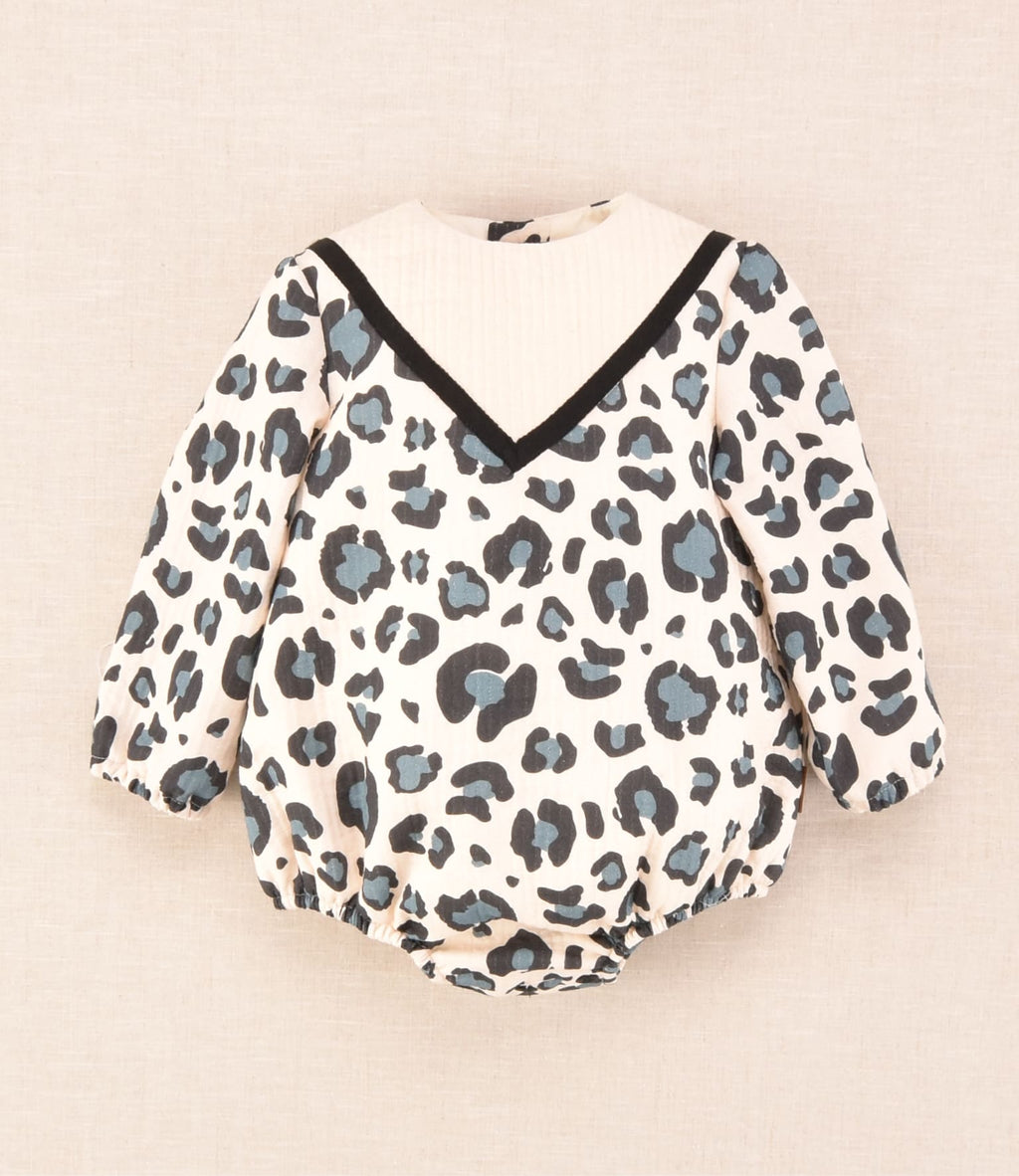Pelele de bebé manga larga con estampado leopardo en tonos azulados, colección Cocote x Charanga