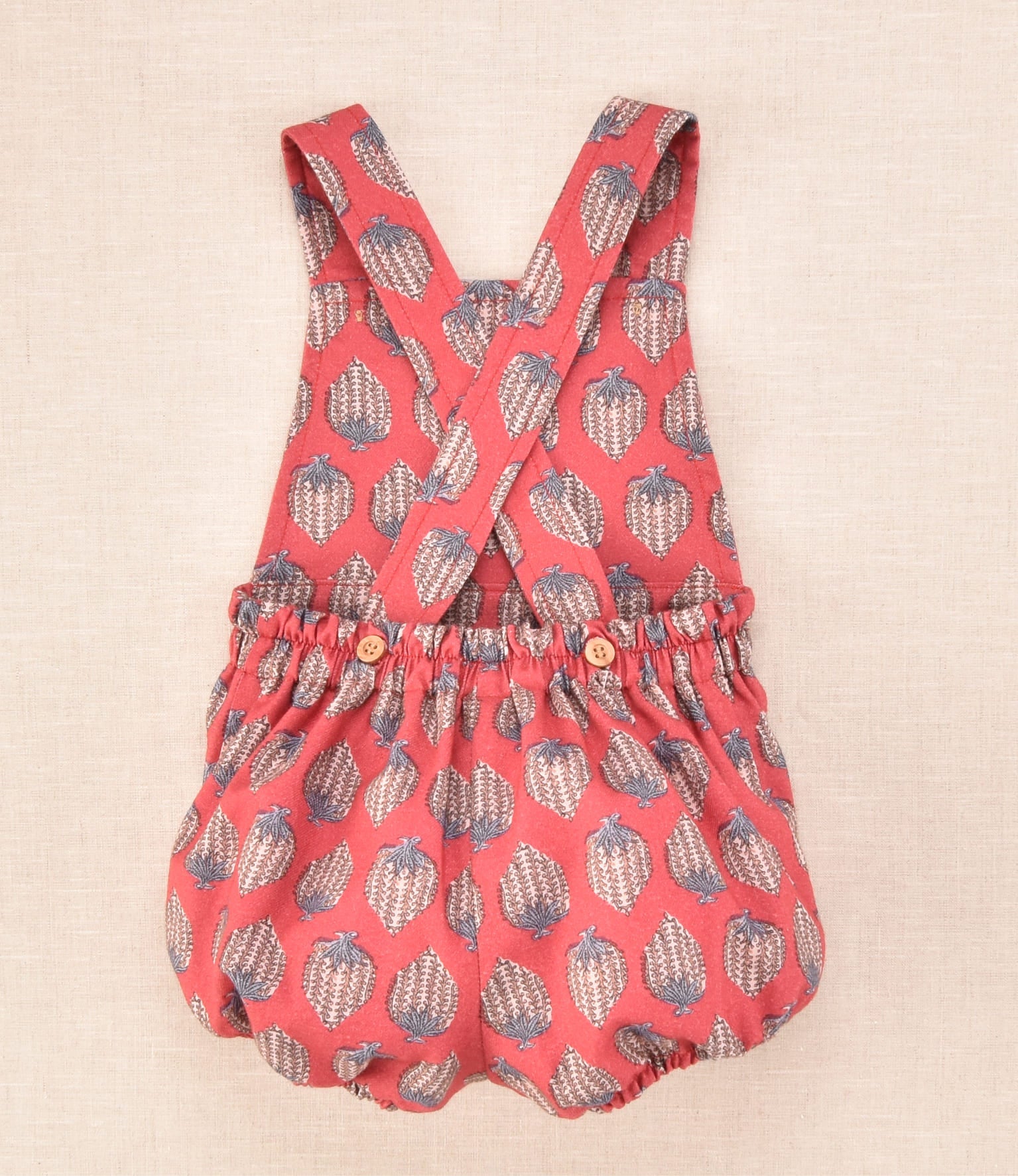 Ranita de bebé burdeo estampada con tirantes cruzados | Colección Cocote x Charanga