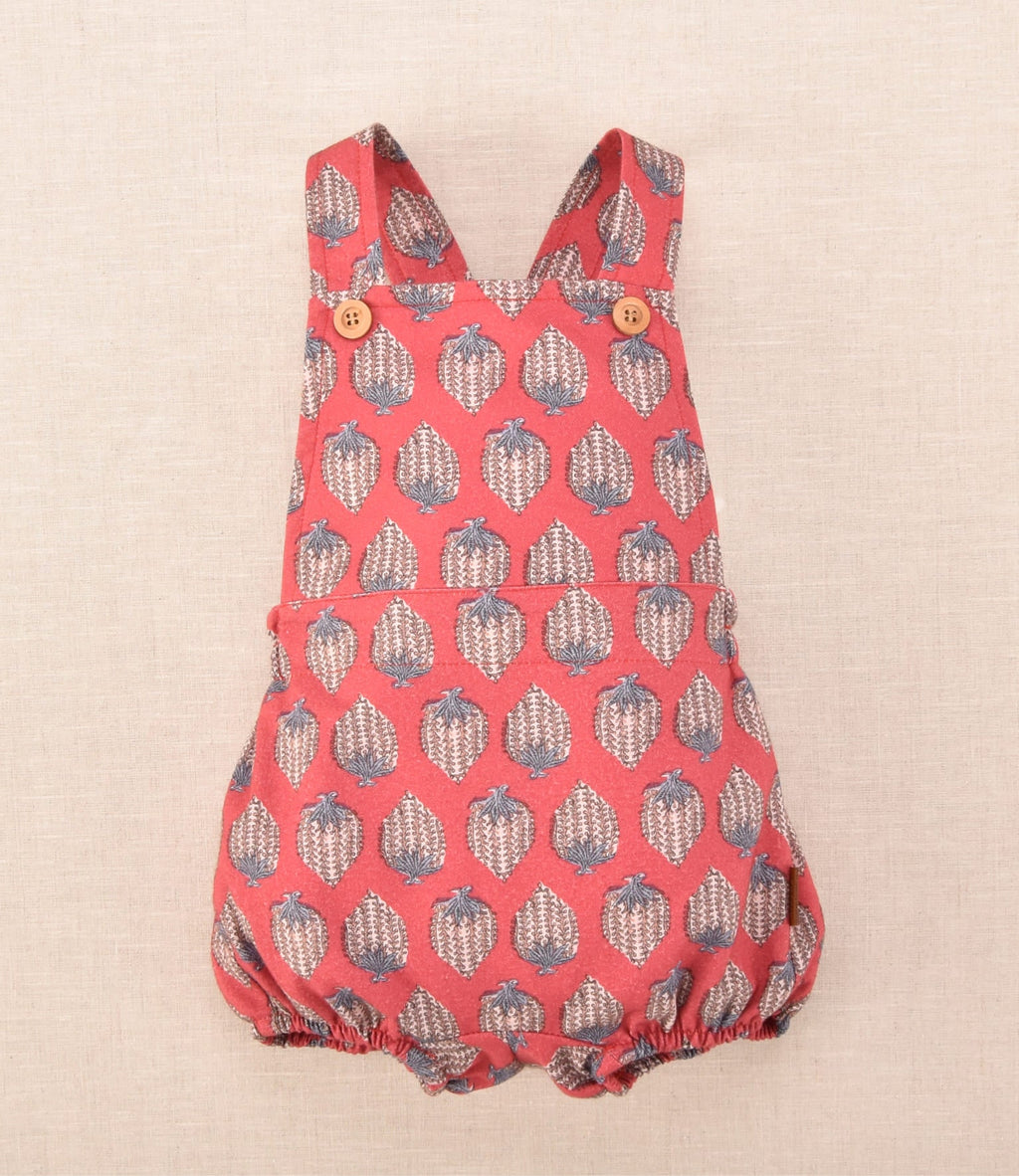 ranita de bebé burdeo estampada con tirantes cruzados de la colección Cocote x Charang