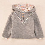 Chaqueta de bebé en tejido borreguito gris con capucha y forro estampado de perritos Cocote x Charanga