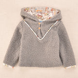 Chaqueta de bebé en tejido borreguito gris con capucha y forro estampado de perritos Cocote x Charanga