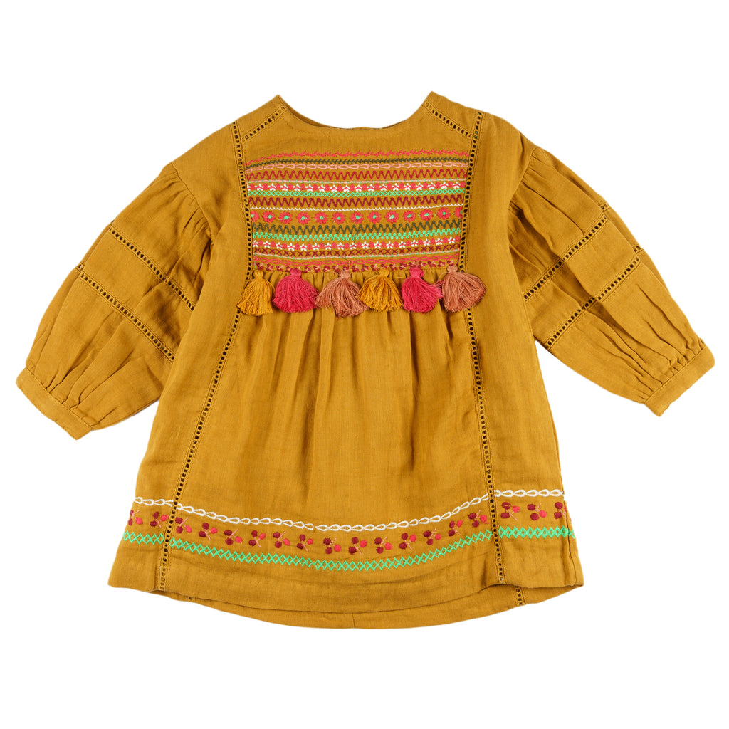 Vestido niña mostaza bambula bordado con borlas