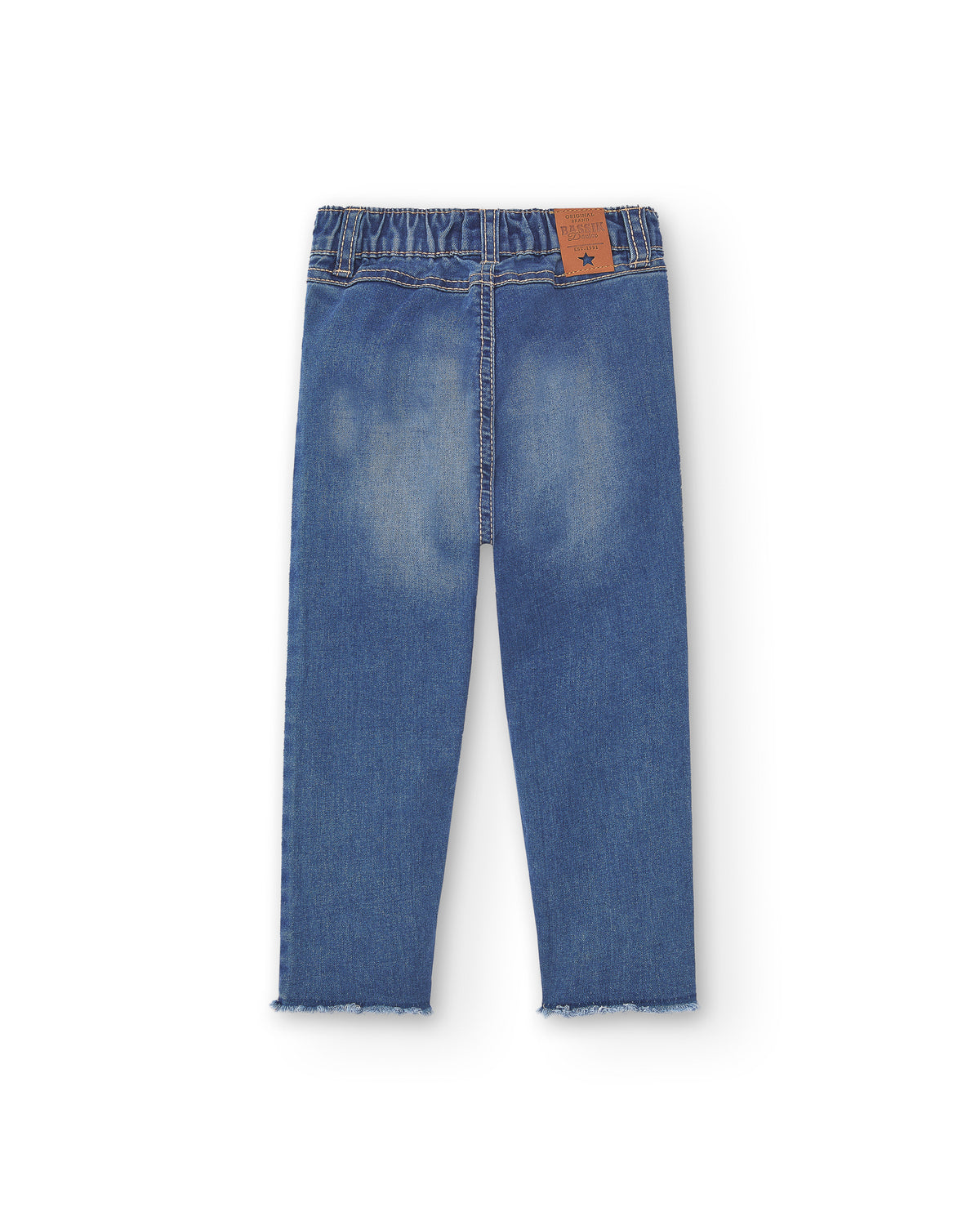 vista trasera pantalón vaquero niña azul con pernera ajustada