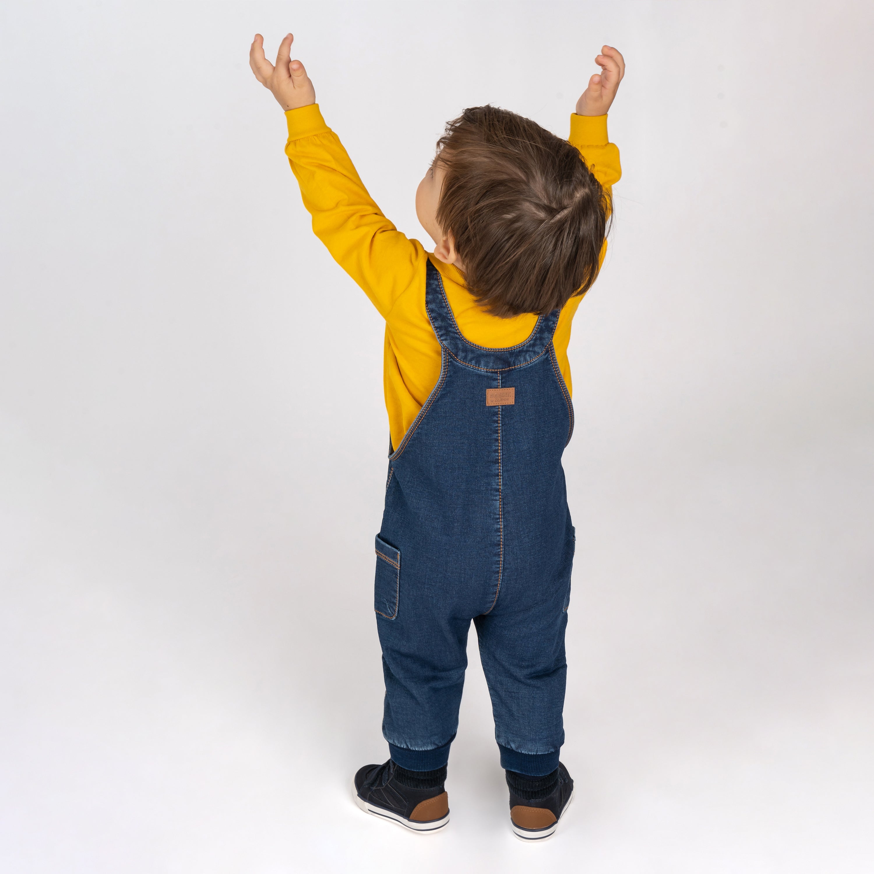 Peto de bebé tejano oscuro bolsillos