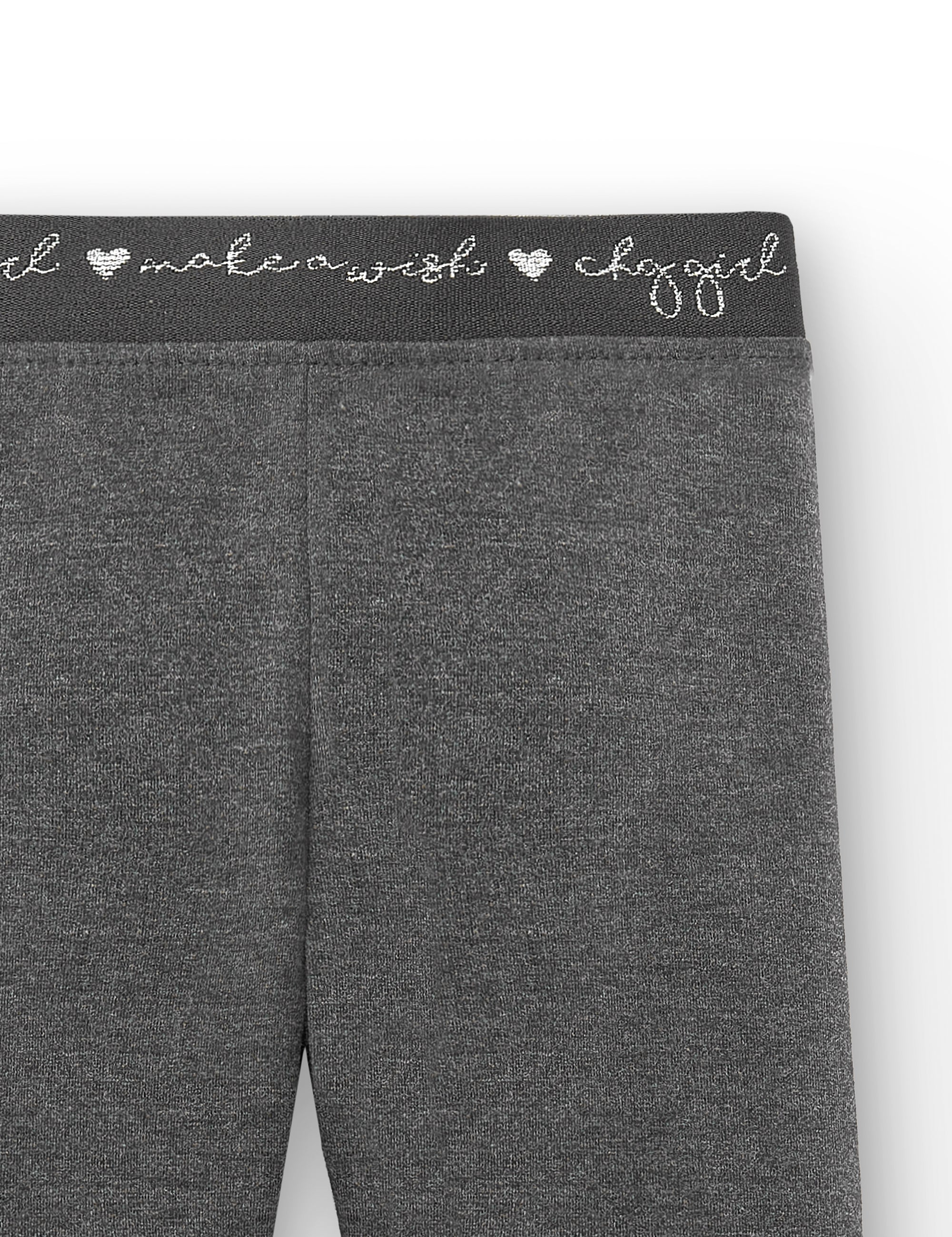 detalle pretina decorada en legging antracita niña