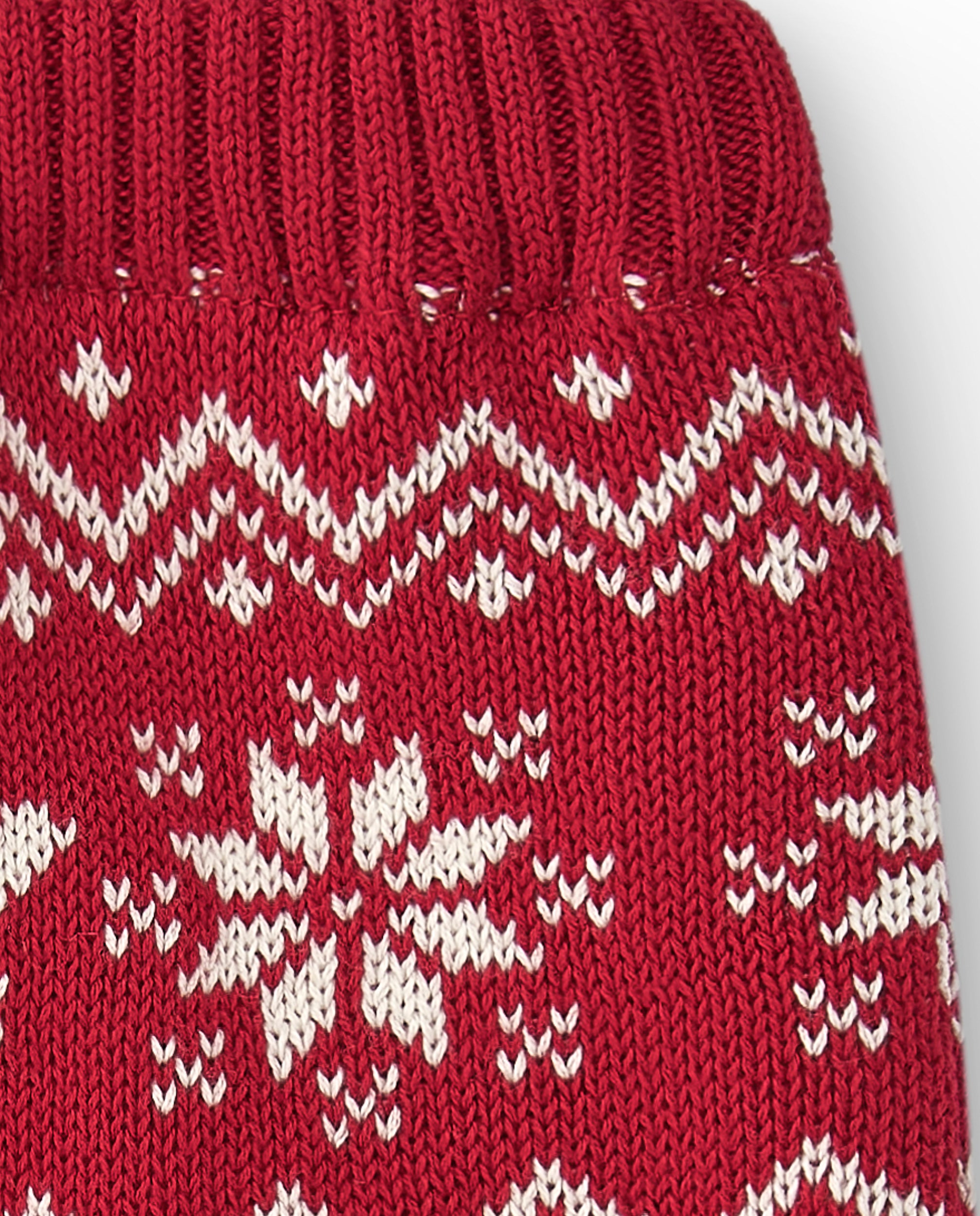 Detalle estampado invernal Jacquard en legging rojo bebé recién nacido primer plano Charanga