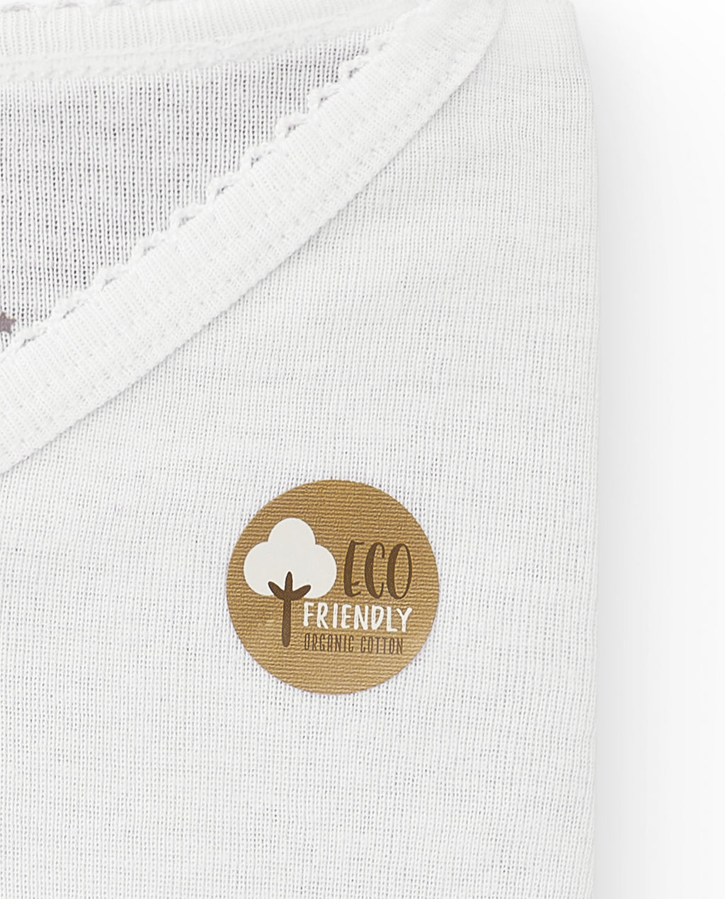 Camiseta interior de niña en algodón orgánico con cuello pico