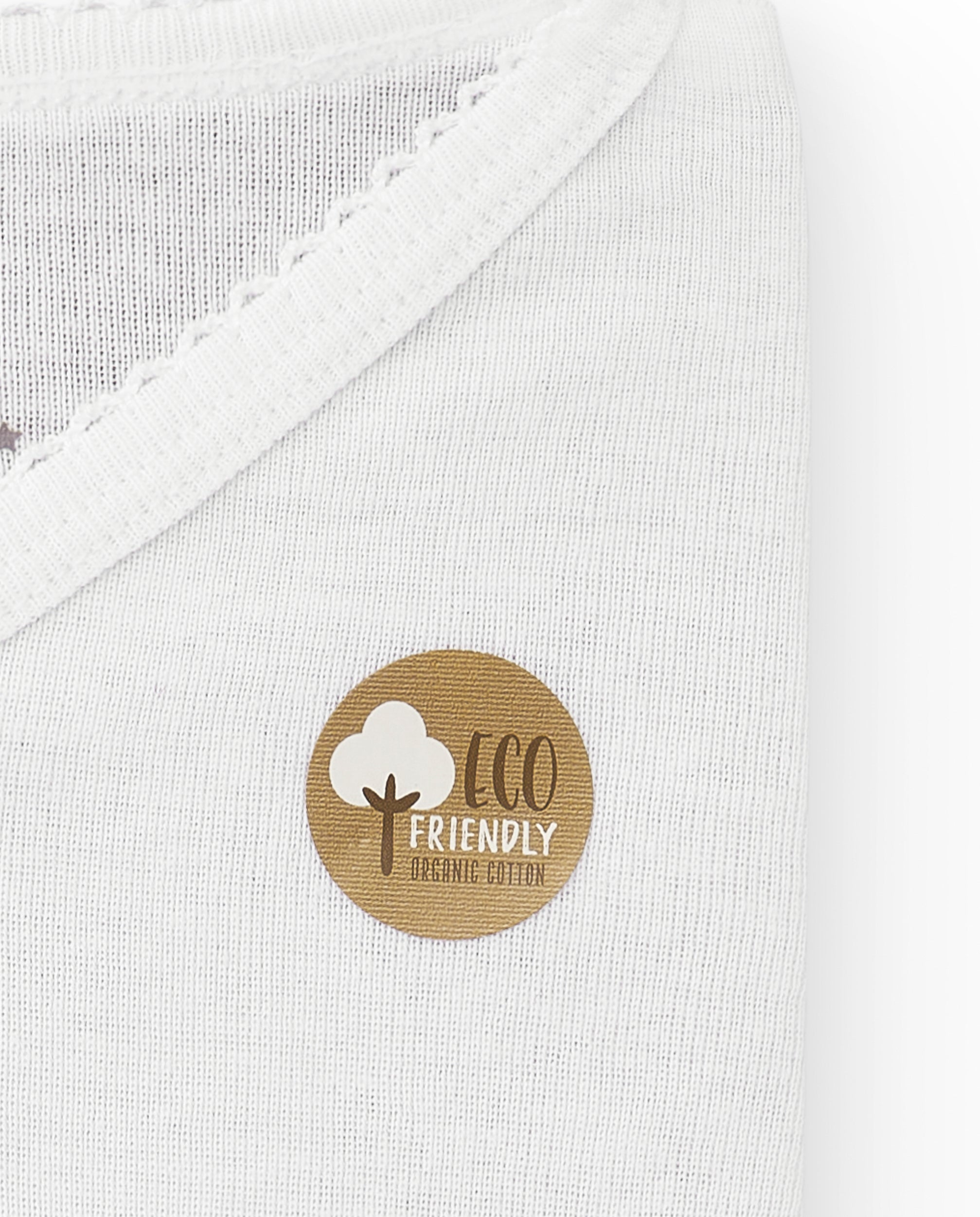 Camiseta interior de niña en algodón orgánico con cuello pico