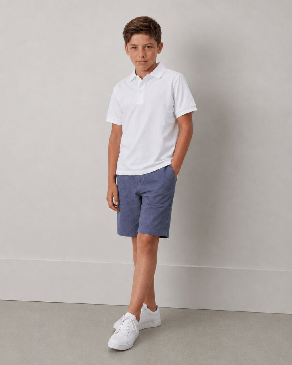 Polo de niño blanco