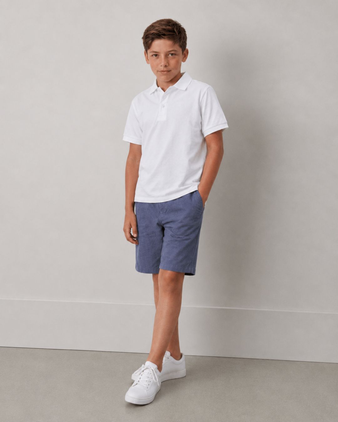 Polo de niño blanco