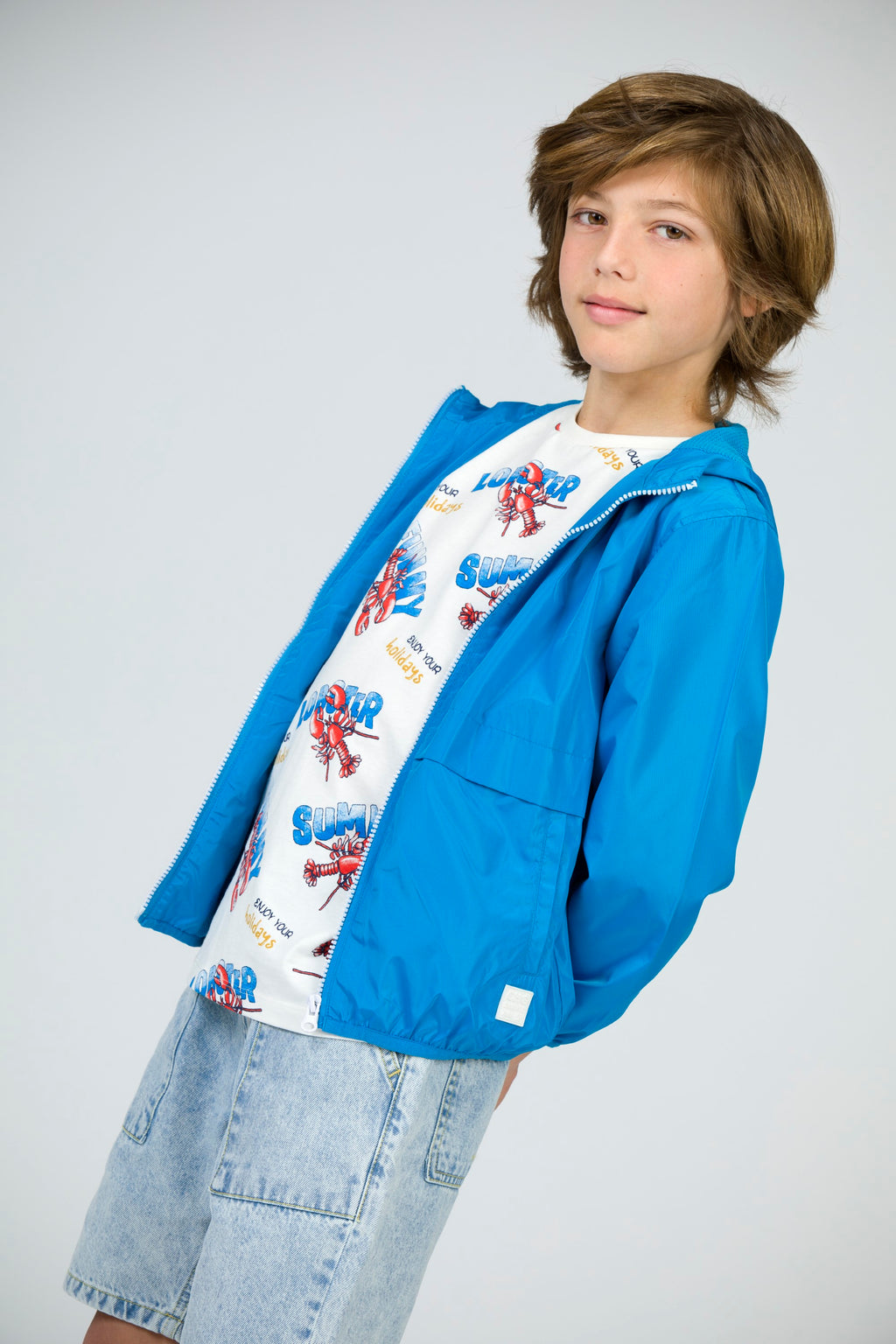parka infantil azulón unisex con capucha y cremallera
