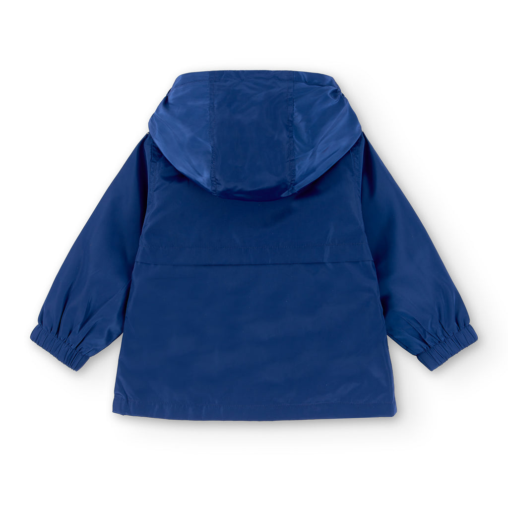vista trasera parka bebé azul marino con capucha