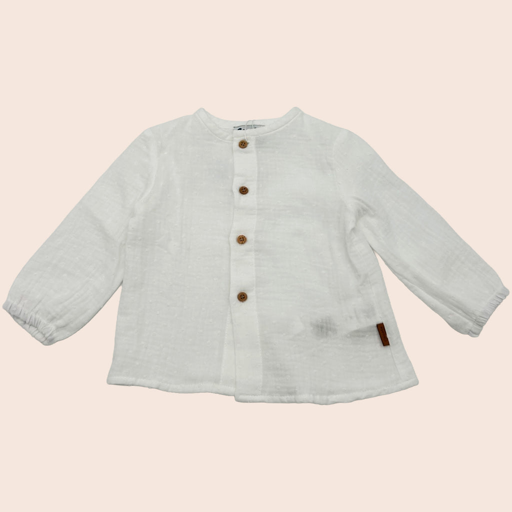 Blusa de bebé blanca con botones de madera | Cocote x Charanga