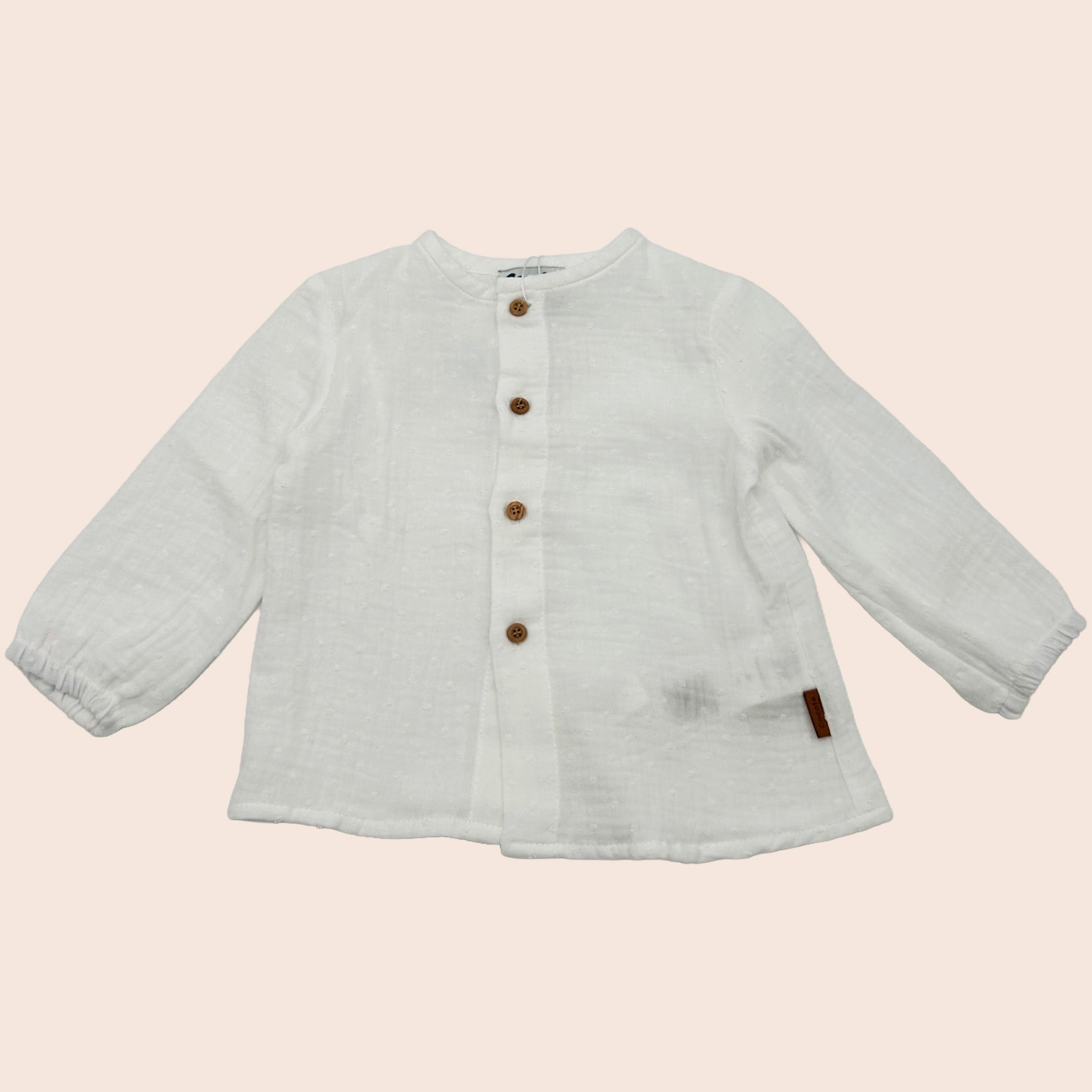 Blusa de bebé blanca con botones de madera | Cocote x Charanga