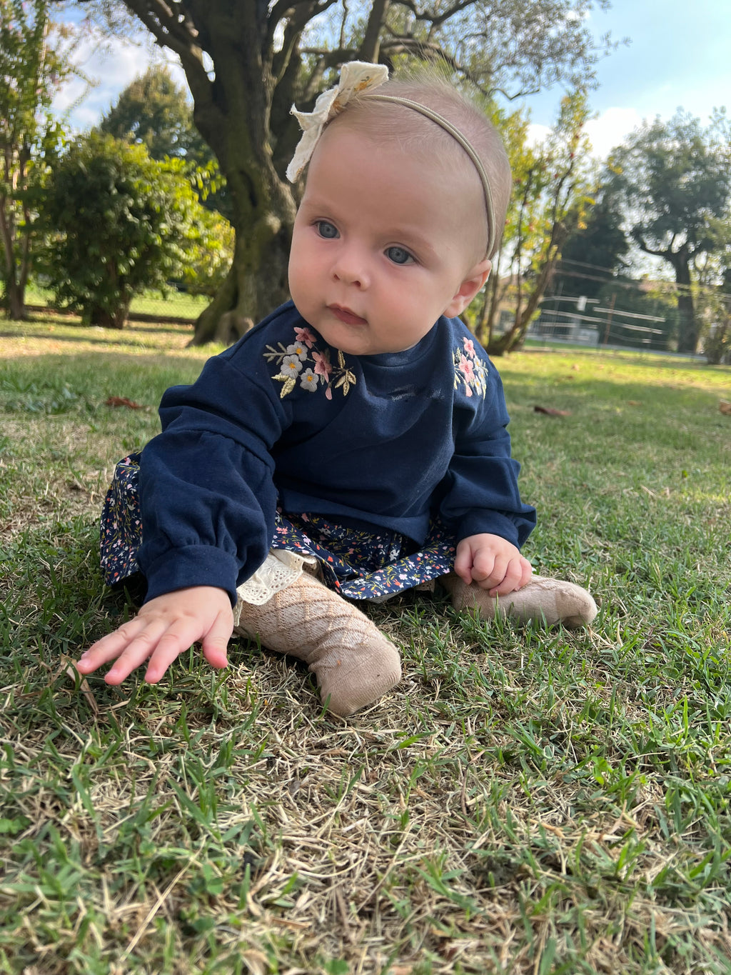 Vestido de bebé marino estampado flores Charanga