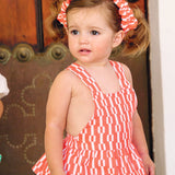 Peto corto rojo y blanco bebé niña