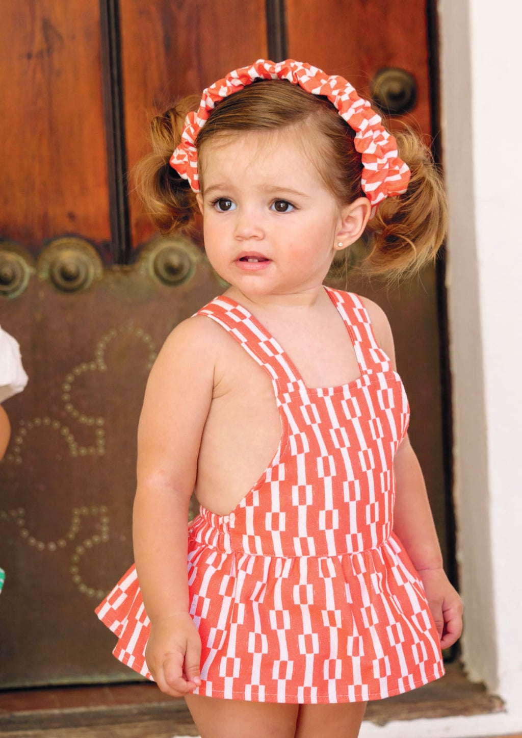 Braguita bebé niña estampado geométrico rojo y blanco