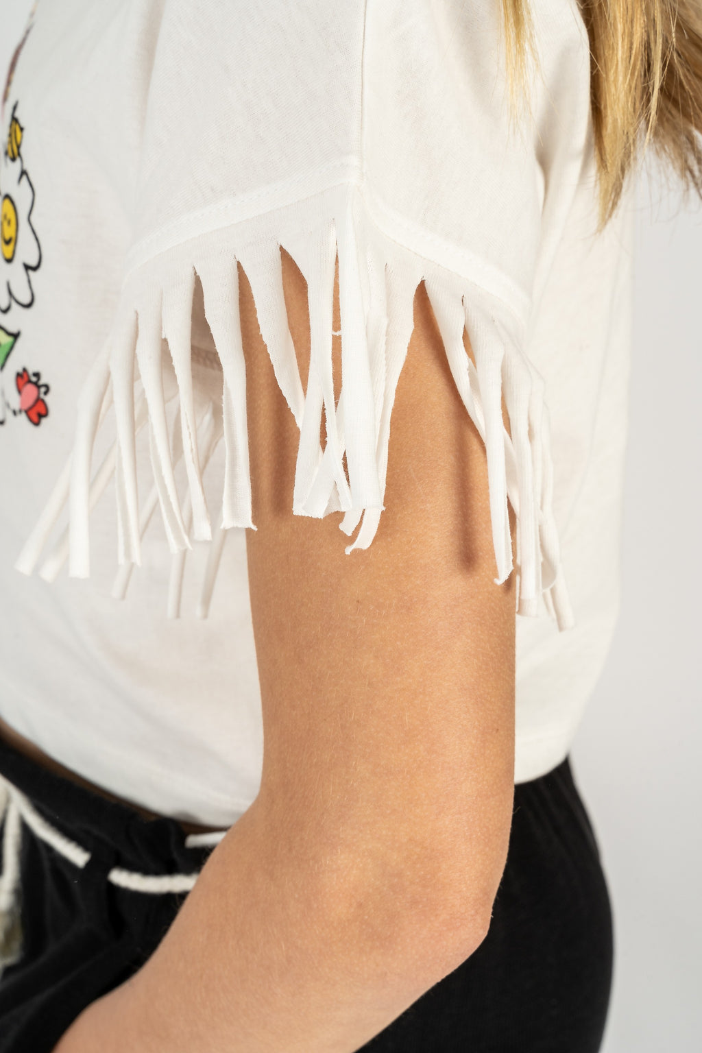 Camiseta de niña blanca detalle flecos VERANO/Outlet