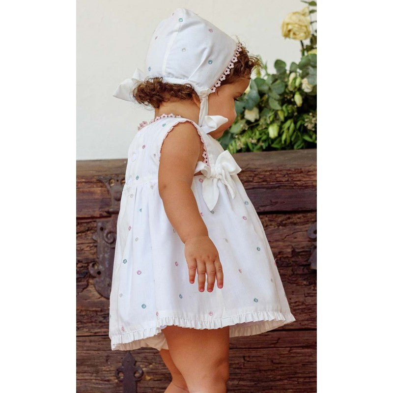 Conjunto vestido, braguita y capota perforado rosa lazos bebé | Cocote by Charanga