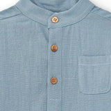 Light blue child's blouse with Cocote & Charanga sleeves