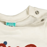 Camiseta de bebé de manga larga color crudo