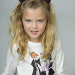 Camiseta de niña en color crudo con dibujo de brujas Charanga